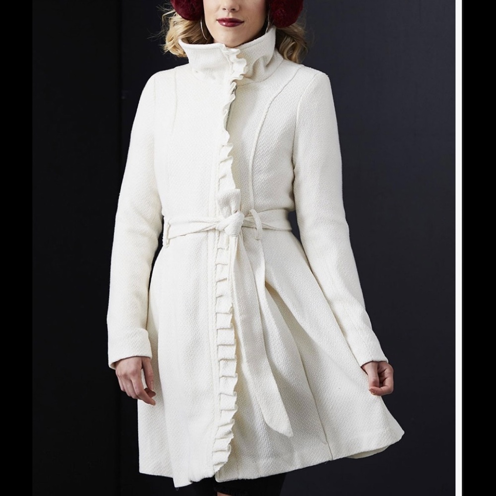 Steve Madden - Ivory ruffle-accented, belted trench coat.